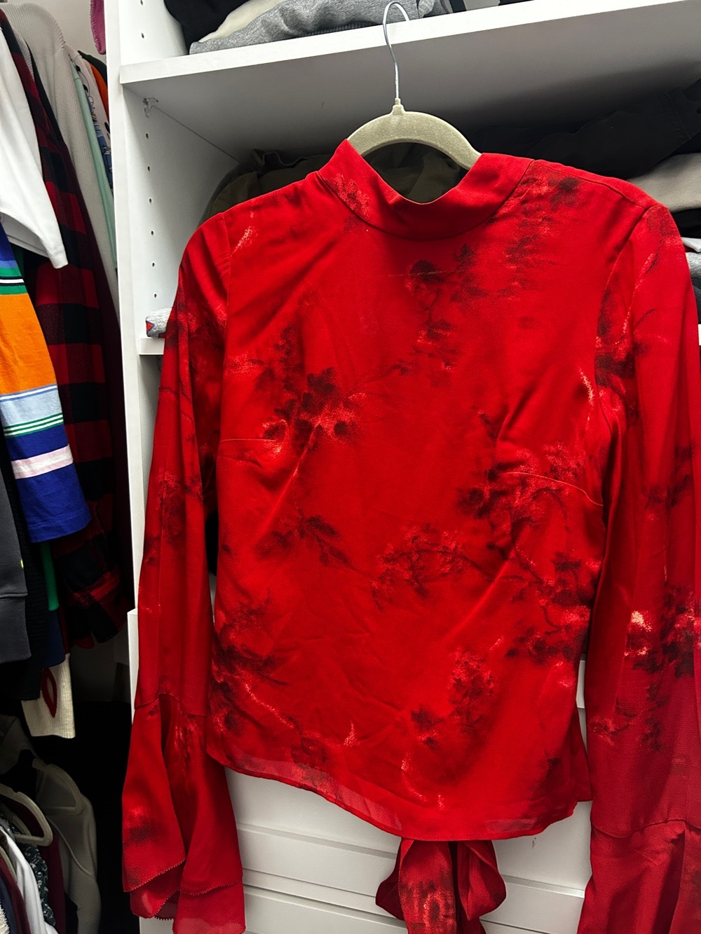 Roxana top in a vermillion red floral print, featuring a mock neck & flutter sle - Picture 12 of 13